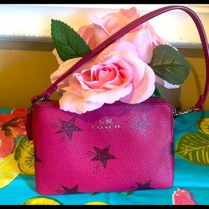 Coach wristlet with star designs